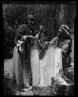 Adelbert Bartlett and woman, both in Arab-style clothing, Jerusalem, 1925