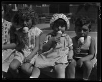 Four children eating ice cream cones from a concession at Abbot Kinney Pier, Venice, 1928