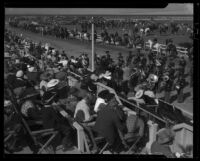 Horseback riders and band at Desert Circus Rodeo on the track at Palm Springs Field Club, Palm Springs, 1938