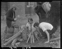 Girl Scouts building campfire, Pacific Palisades, 1927