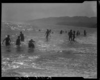 Swimmers in ocean, Pacific Palisades, 1928