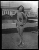 Actress Edna Aslin modeling political bathing suit, Santa Monica, 1931