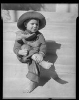 Child seated on steps, Los Angeles, circa 1935