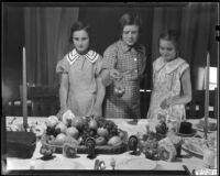 Girls setting Thanksgiving table, Los Angeles, circa 1935