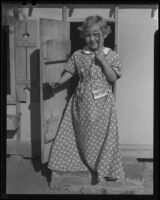 Girl at door of playhouse, Los Angeles, circa 1935