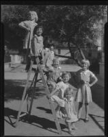 Girls posing on ladder, Los Angeles, circa 1935