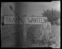 Man with Tramps Wanted sign, Visalia, 1920