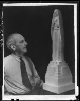 Sculptor Eugene Morahan with a model of his statue of Saint Monica, circa 1934