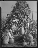 Carolyn Bartlett with corn and pumpkins, Santa Monica, 1931