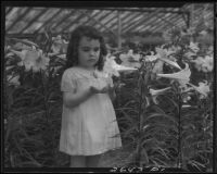 Diane King among Easter lilies, 1934