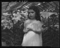 Diane King among Easter lilies, 1934