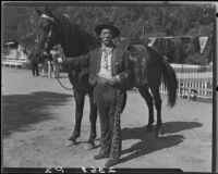 Eugene R. Plummer with horse, West Hollywood, 1931