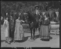 Eugene R. Plummer, on horseback, with 4 women, West Hollywood, 1931