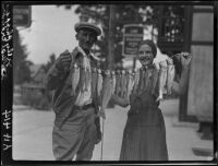 George Crowder and Sally Phipps with string of trout, Lake Arrowhead, 1929