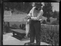 Man with trout, Lake Arrowhead, 1929