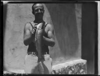 Man with trout, Lake Arrowhead, 1929