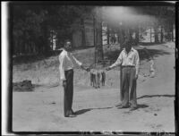 Men with string of trout, Lake Arrowhead, 1929