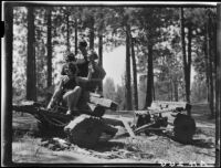 Women and logging equipment, Lake Arrowhead, 1929