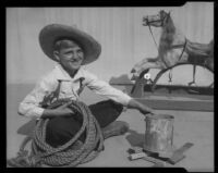 Boy dressed as cowboy, Los Angeles, circa 1935