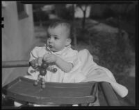 Baby in highchair, Los Angeles, 1935