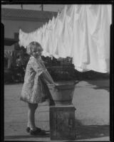 Girl doing laundry, Los Angeles, circa 1935
