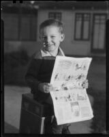 Boy with newspaper, Los Angeles, circa 1935