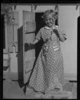 Girl at door of playhouse, Los Angeles, circa 1935