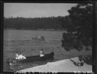 Canoe and rowboat on lake, Lake Arrowhead, 1929
