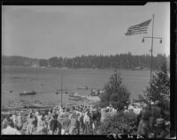 Crowd on lakeshore, boats on lake, Lake Arrowhead, 1929