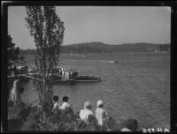 Spectators watching motorboat racing, Lake Arrowhead, 1929
