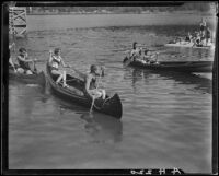 Young people in canoes and on dock, Lake Arrowhead, 1929