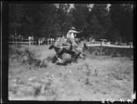 Rodeo rider performing, Lake Arrowhead Rodeo, Lake Arrowhead, 1929