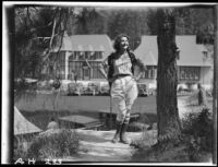 Sally Phipps posing with hands on hips, Lake Arrowhead, 1929