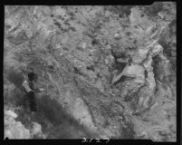 Men on rocky hillside near Magic Mountain, Ventura County, 1930
