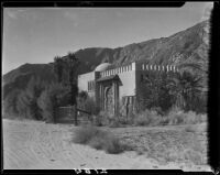 Villa Dar Marroc, the studio and home of painter Gordon Coutts, with crenelated roofline, dome, and horseshoe arches, Palm Springs, 1924-1937