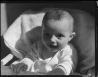 Baby in highchair, Los Angeles, circa 1935