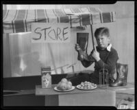 Boy playing store, Los Angeles, circa 1935