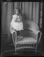 Carolyn Bartlett in wicker chair, Santa Monica, circa 1923