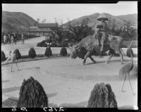 Statue of Tenjin reading on the back of an ox, Bernheimer Gardens, Pacific Palisades, 1927-1940
