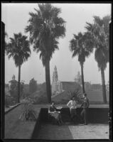 Holton Arms patio, palm trees, and St. Vincent Catholic Church, Los Angeles, [1920-1939?]