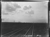 Railroad tracks and clouds, Kansas, Colorado, or New Mexico, 1925