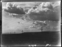 Clouds and utility poles, Kansas, Colorado, or New Mexico, 1925