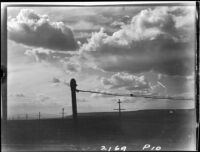Clouds and utility poles, Kansas, Colorado, or New Mexico, 1925