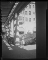 Woman with parasol, Virginia Hotel, Long Beach, 1929