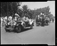 Decorated car and wagon with dancers, Santa Monica Pioneer Days parade, Santa Monica, 1930 or 1931