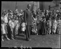 William Gibbs McAdoo and group at Golden Rule Foundation Pageant, Los Angeles, 1930
