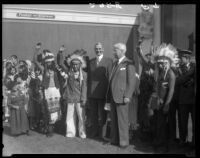 William Gibbs McAdoo, John Willis Baer, and group in American Indian native dress at the Golden Rule Foundation Pageant, Los Angeles, 1930