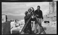 Cameraman Frank Goodliffe and filmmaker Paul Rotha on the Acropolis during the filming of Contact, Athens, 1933