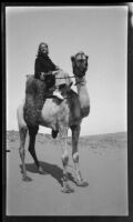 Margaret Rotha on a camel, Aswān, Egypt, 1933