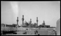 View towards the domes and minarets of Al Kadhimain Mosque taken during the filming of Contact, Baghdad, 1932